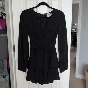 Princess Polly size 4 romper, ties in front, v line top, black with ruffles
